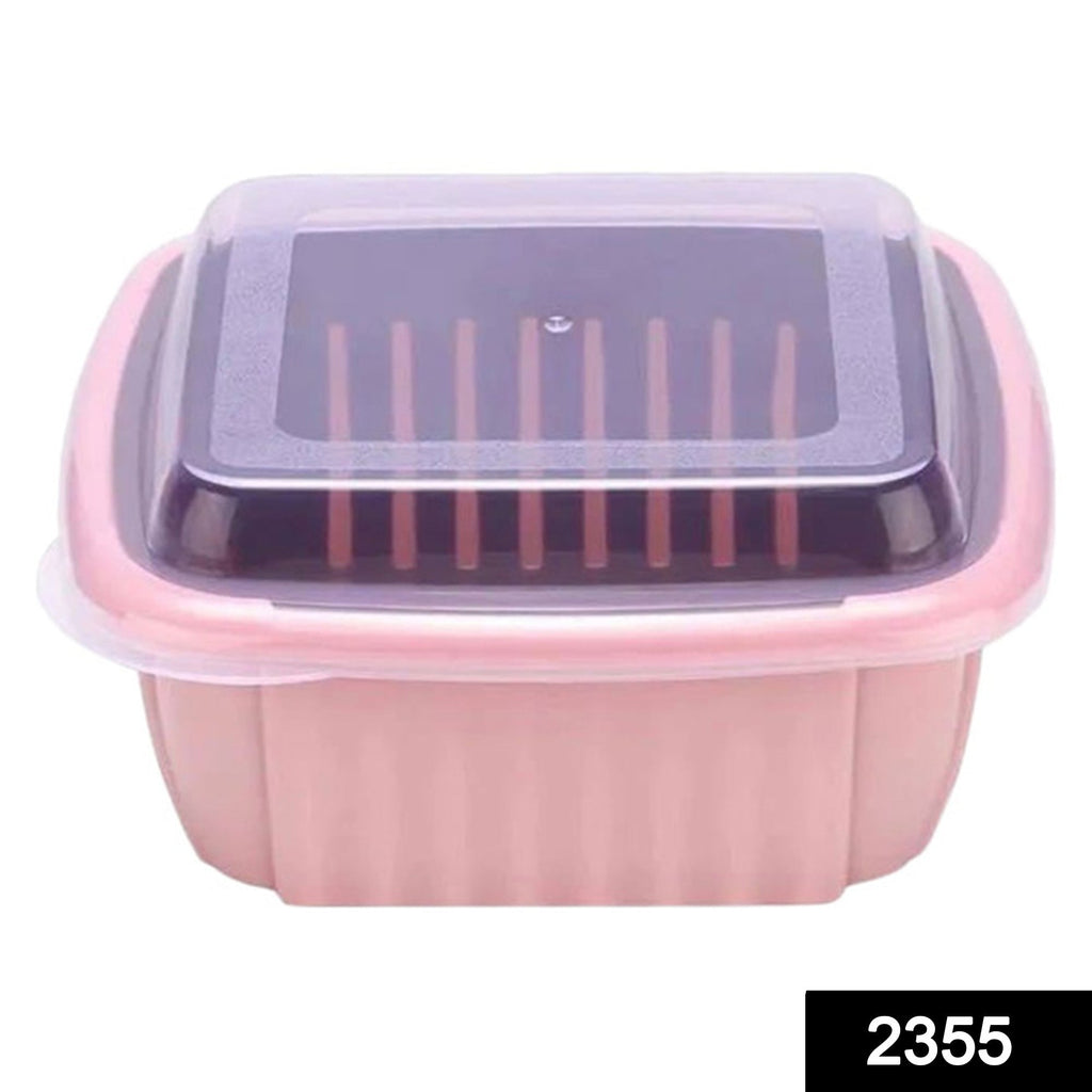Collapsible strainer and food washing basket in a modern kitchen.