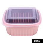Collapsible strainer and food washing basket in a modern kitchen.