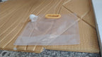 Lifestyle image showing portable airtight food storage bag with handle in kitchen