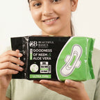 Front view of sanitary pads pack with wings