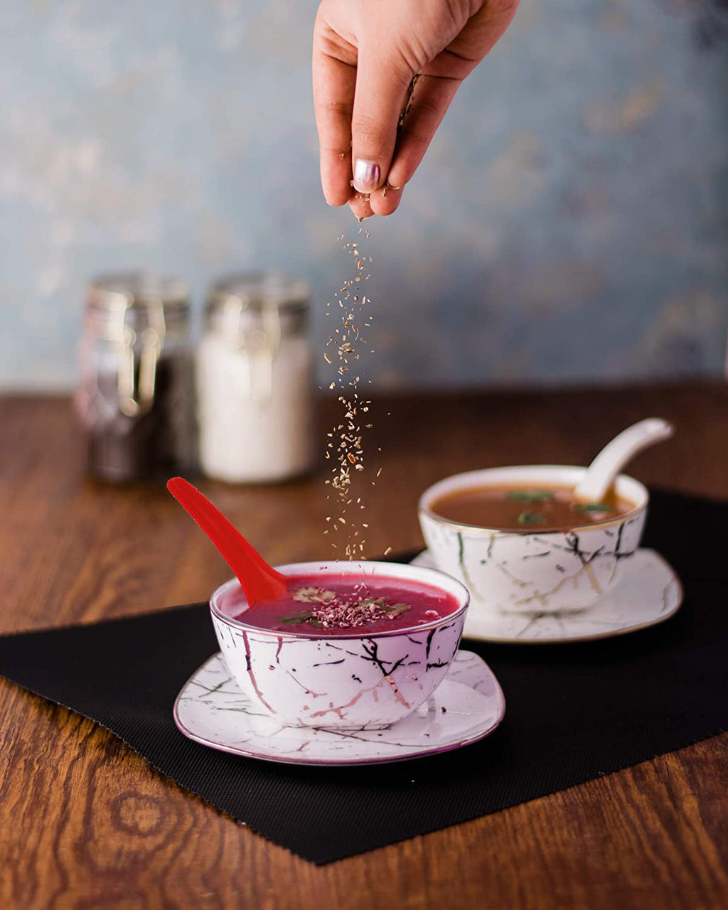 Ergonomic design of Tummy Tide's colorful soup spoons for comfortable use.