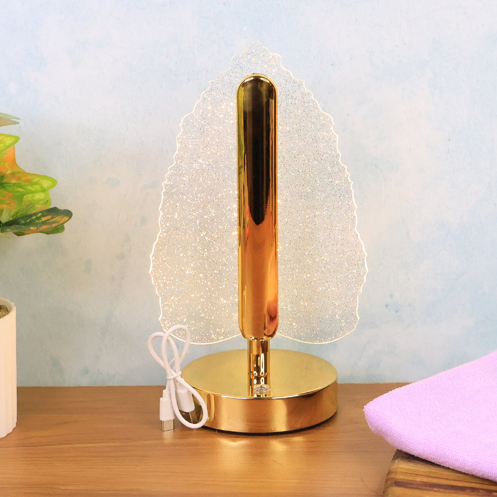 Compact and portable LED crystal table lamp with elegant leaf design for ambient lighting