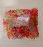 Close-up of versatile multicolor rubber bands for everyday household tasks.