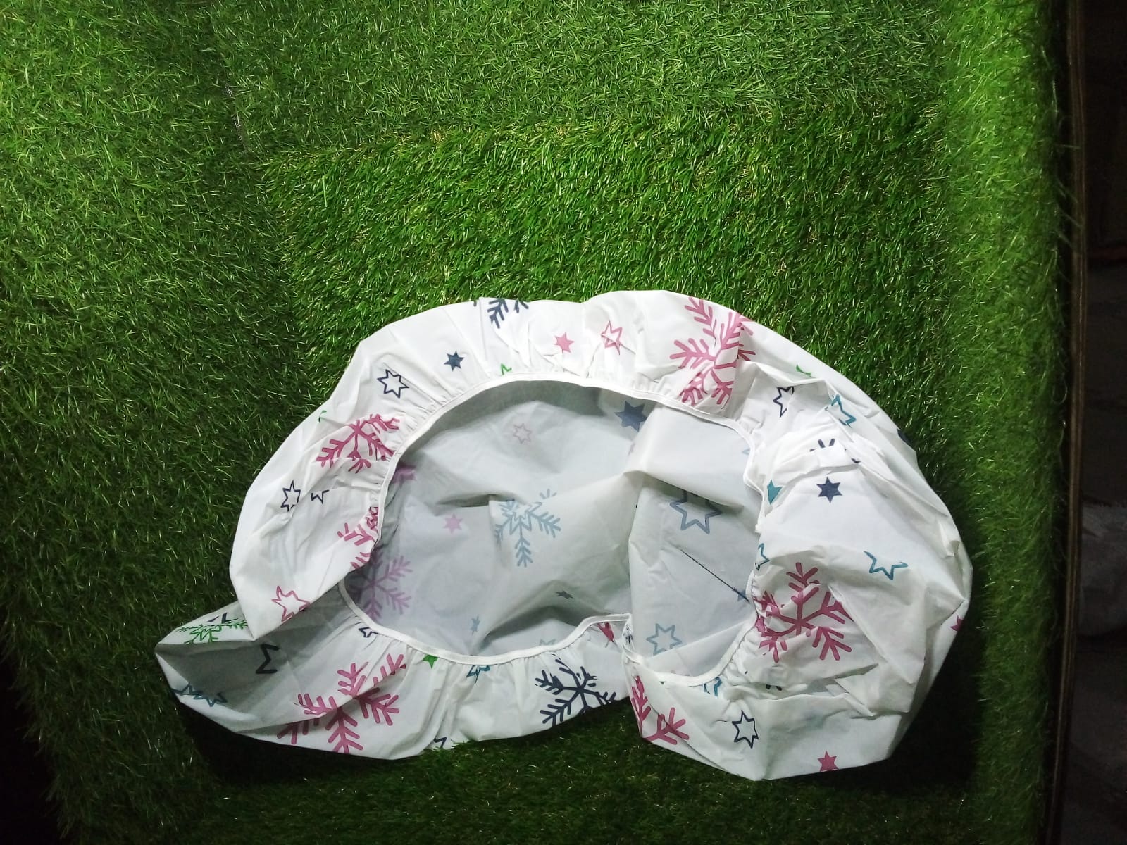 Patterned AC dust cover enhancing the aesthetics of an indoor space.