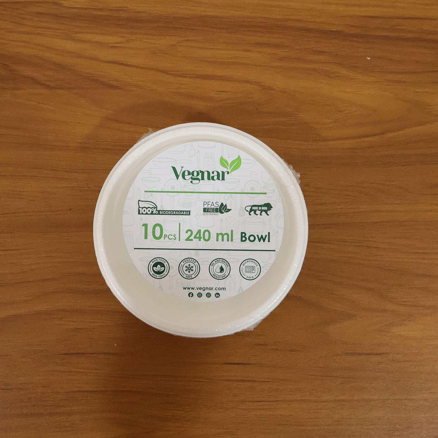 Vegnar compostable bagasse bowls 240ml used in live food serving setting emphasizing eco-conscious choice