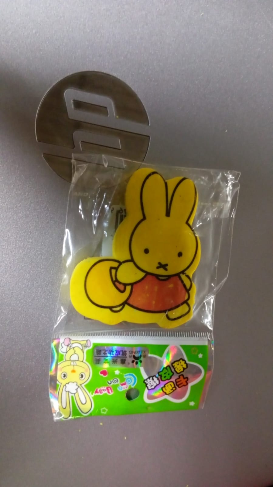 Group of various cartoon design erasers, ready for creative use.