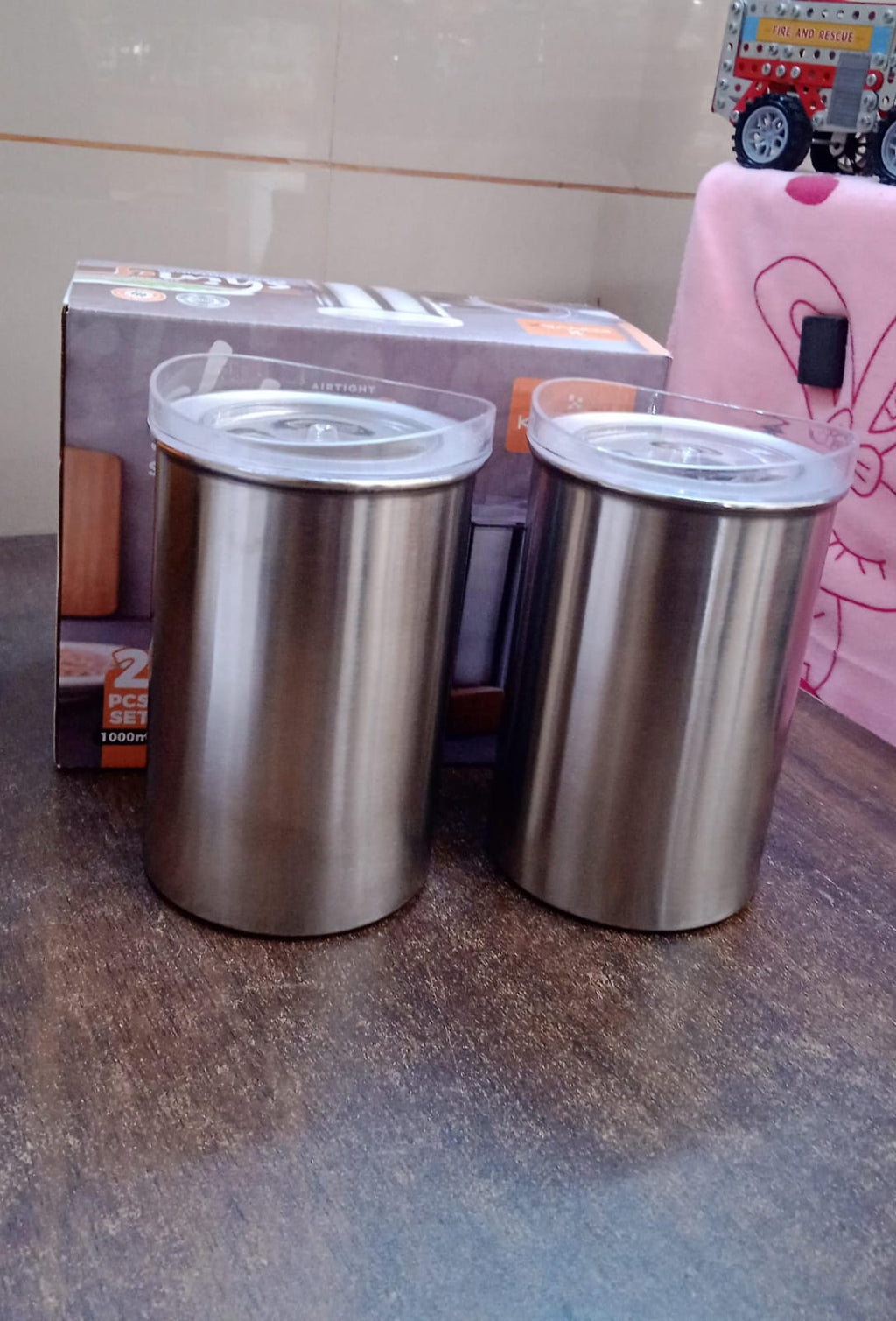 Stainless steel airtight containers from Konvex, perfect for storing dry goods like snacks and pulses.