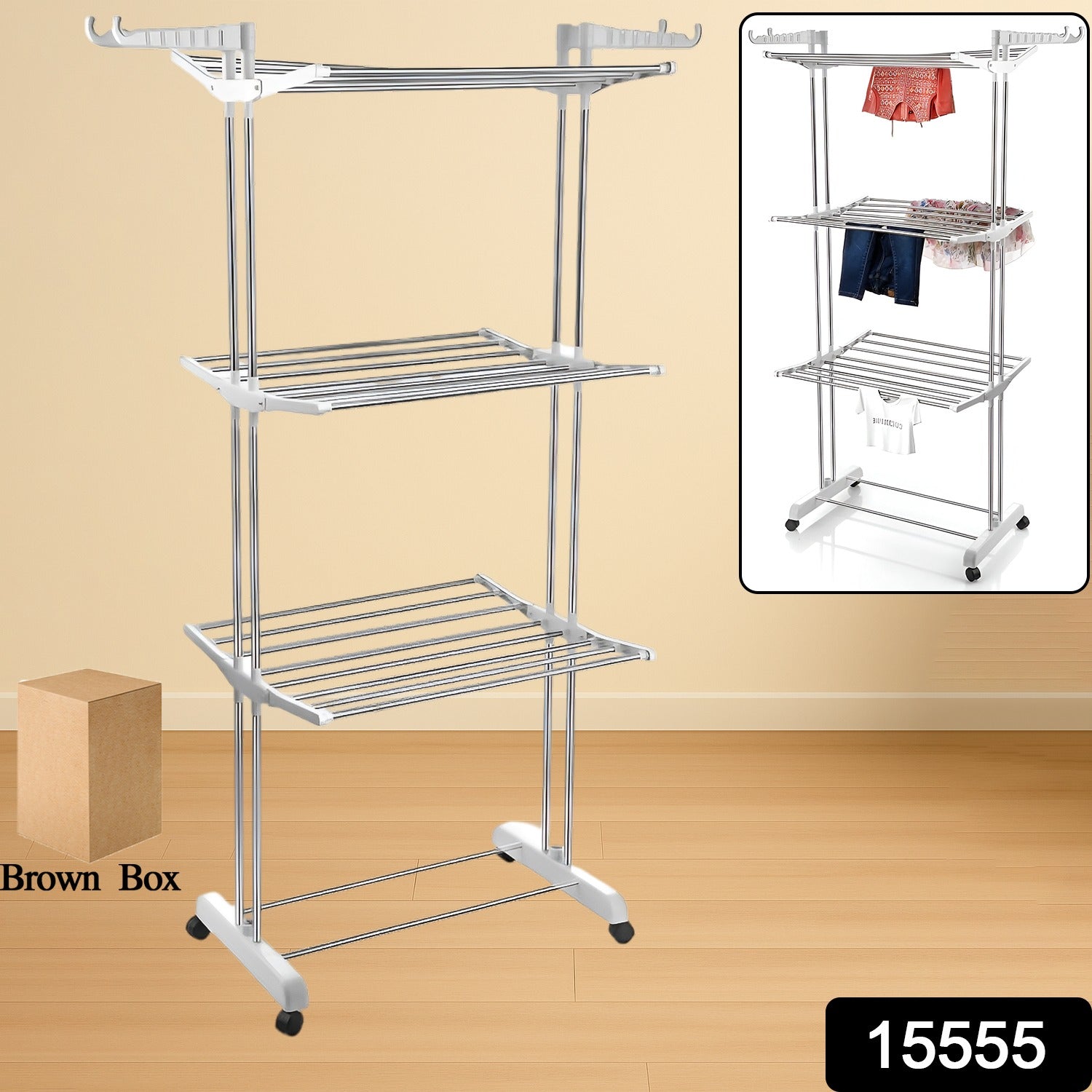 Stainless steel foldable drying rack with clothes drying on its three tiers.
