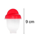 Process of cracking an egg directly into the nonstick egg cooker cup.
