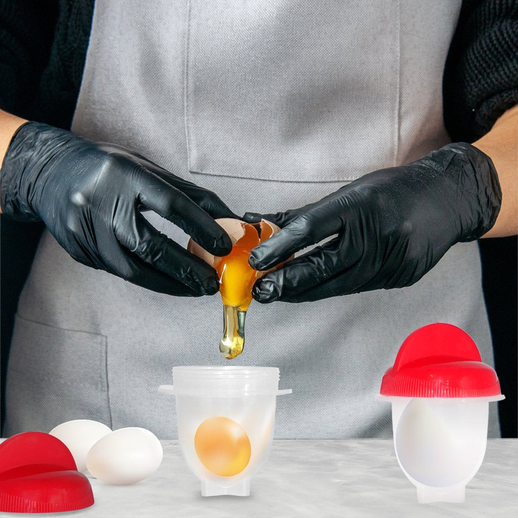 A hand easily removing a perfectly cooked egg from the multi-functional egg mold.