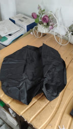 Compact rainproof storage pouch for easy portability of the FERVENT backpack rain cover.