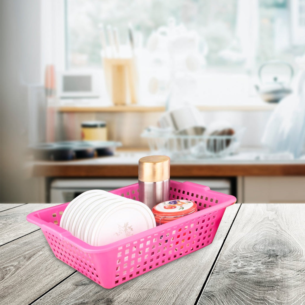 Handwoven cane fruit basket on a kitchen counter.