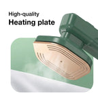 Close-up of the 2-in-1 portable iron's soleplate and water tank, detailing features.