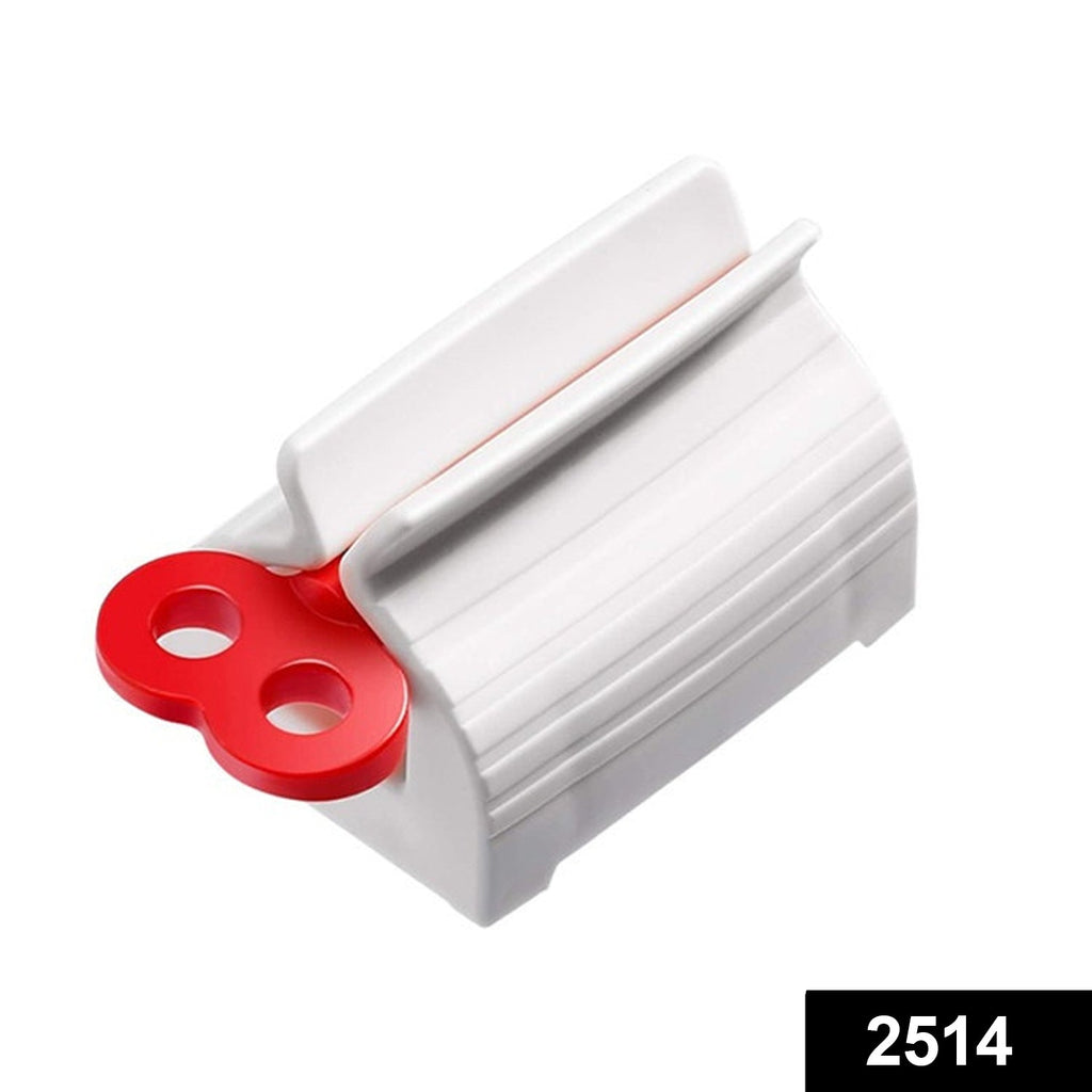 Close-up of the easy-to-turn rolling mechanism of the white toothpaste tube roller.