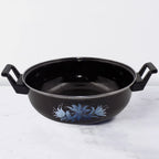 14 inch cast iron kadai showing rustic texture and wide base for Indian cooking