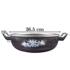 Side angle of cast iron kadai with sturdy handle for safe handling