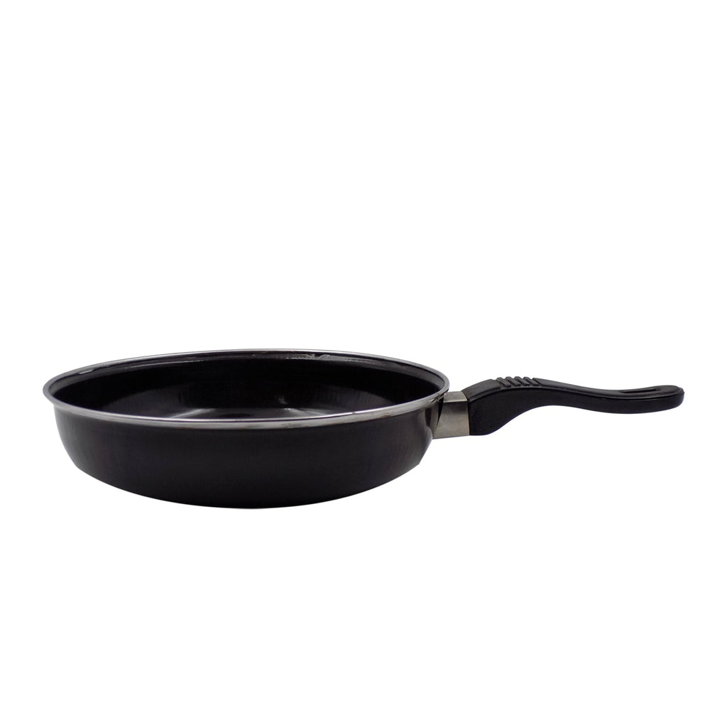 Angled view of the nonstick tadka fry pan, ready for use.