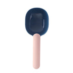 Pet food scoop with an ergonomic handle for comfortable and easy use.