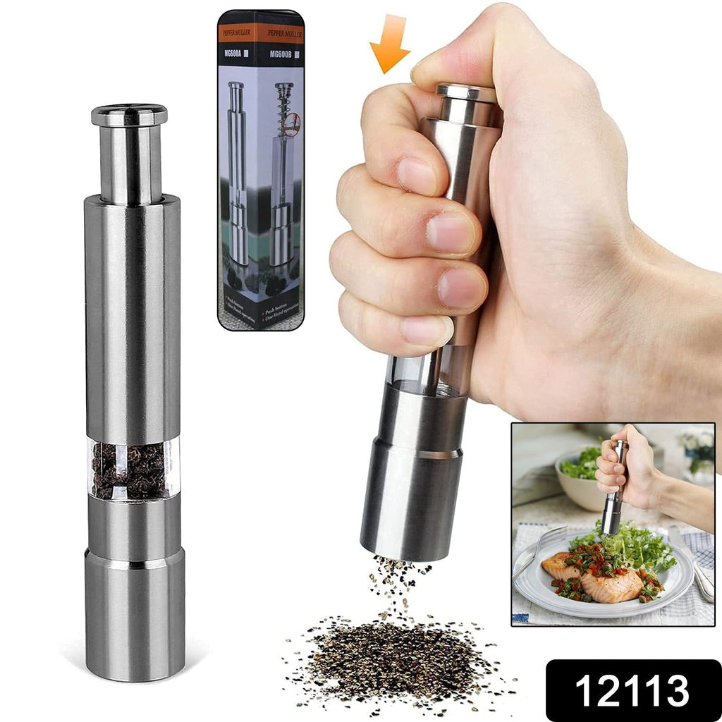 Hand operating a sleek thumb press grinder for fresh pepper.