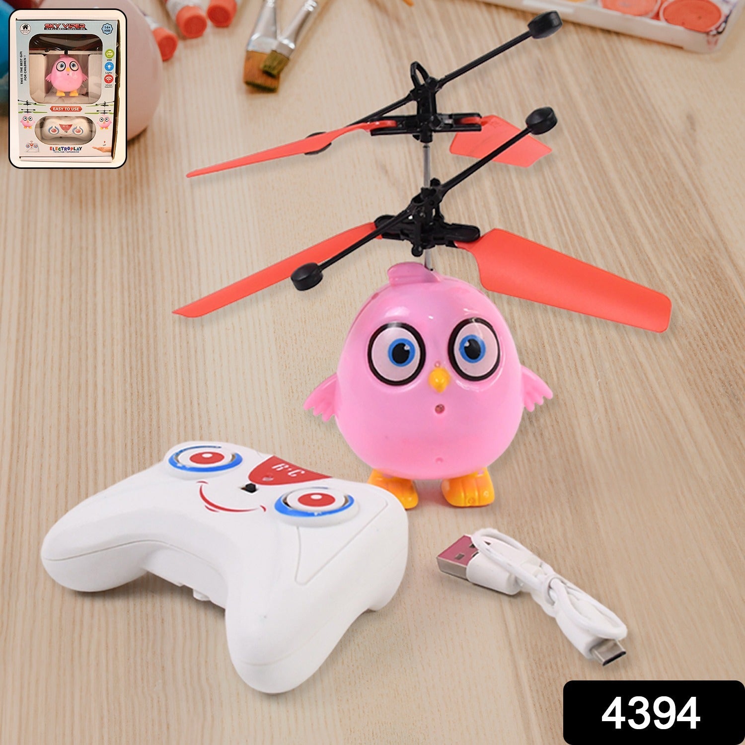 Remote control for Flying Bird RC Toy with a smiling face design