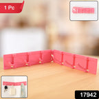 Adhesive wall hook storage rack showcasing 6 sturdy hooks holding kitchen utensils