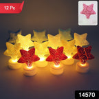 Close up of glowing star shaped LED tealight candles in warm LED light