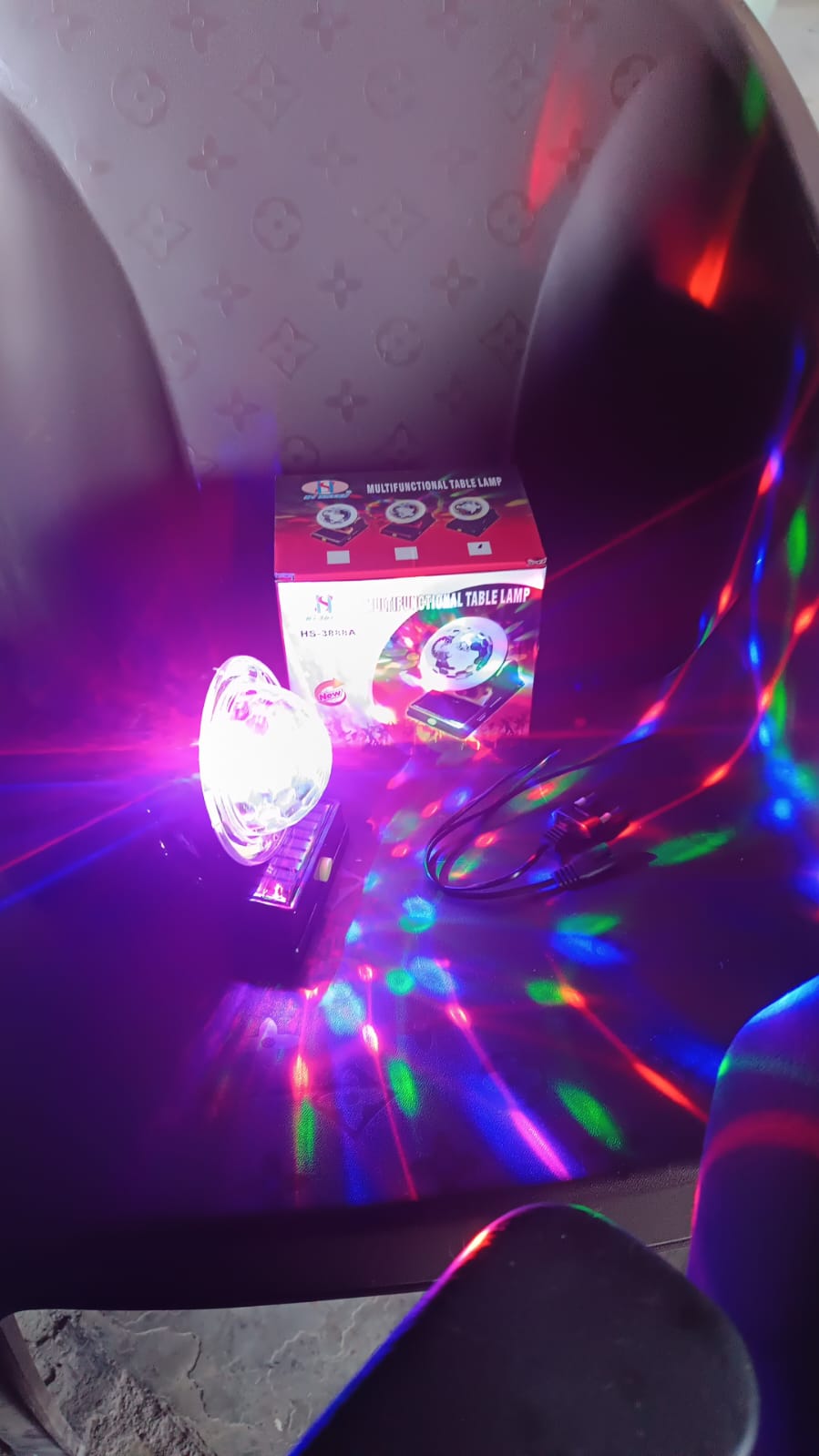 Compact and portable solar LED disco party light for celebrations