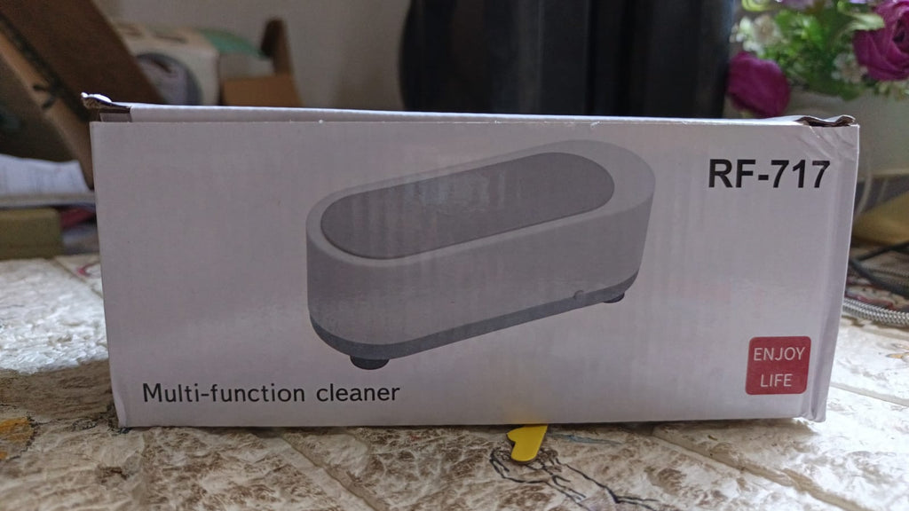 Close-up of the ultrasonic cleaner showcasing the high-frequency cleaning process.