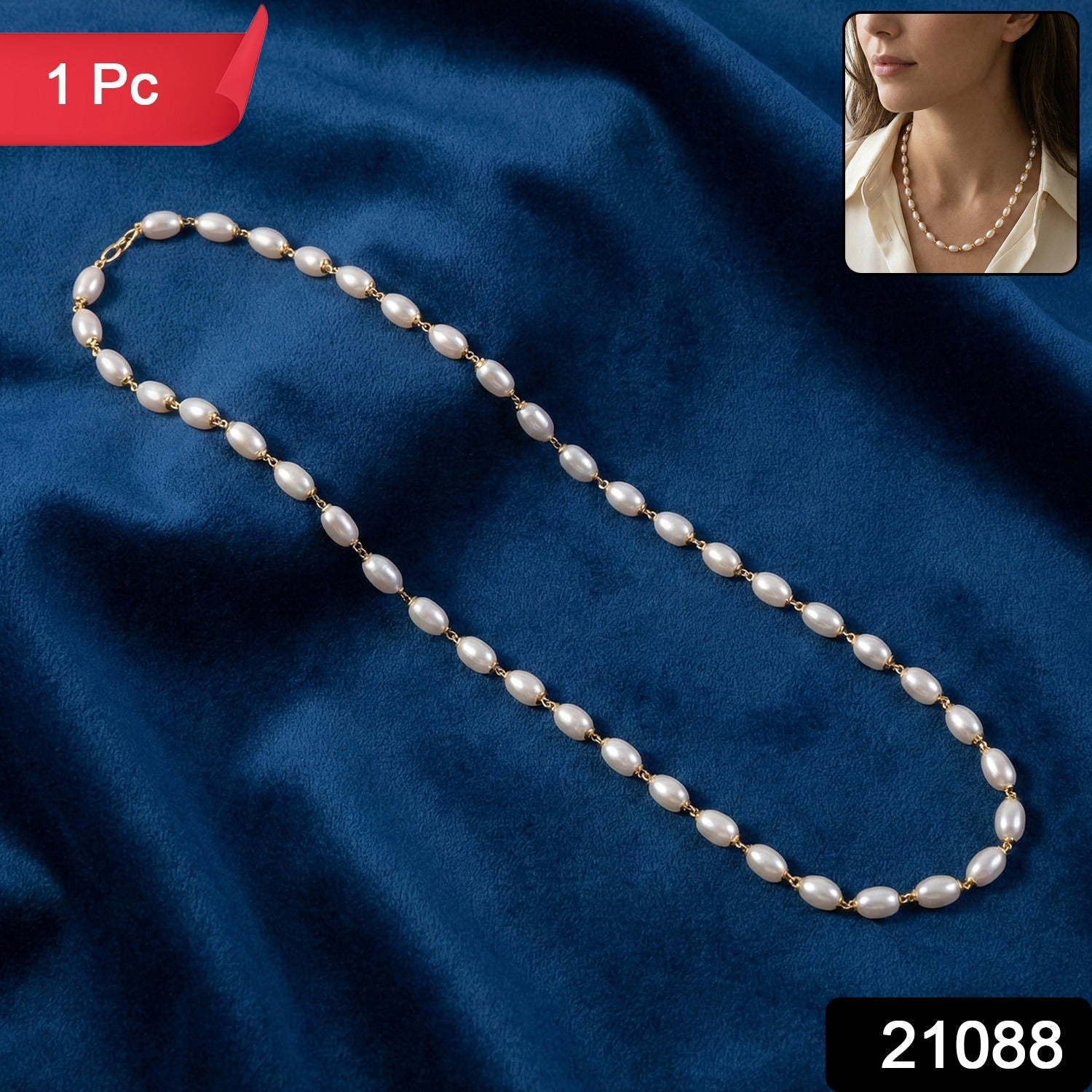 Close-up of gold-tone links on pearl beaded necklace