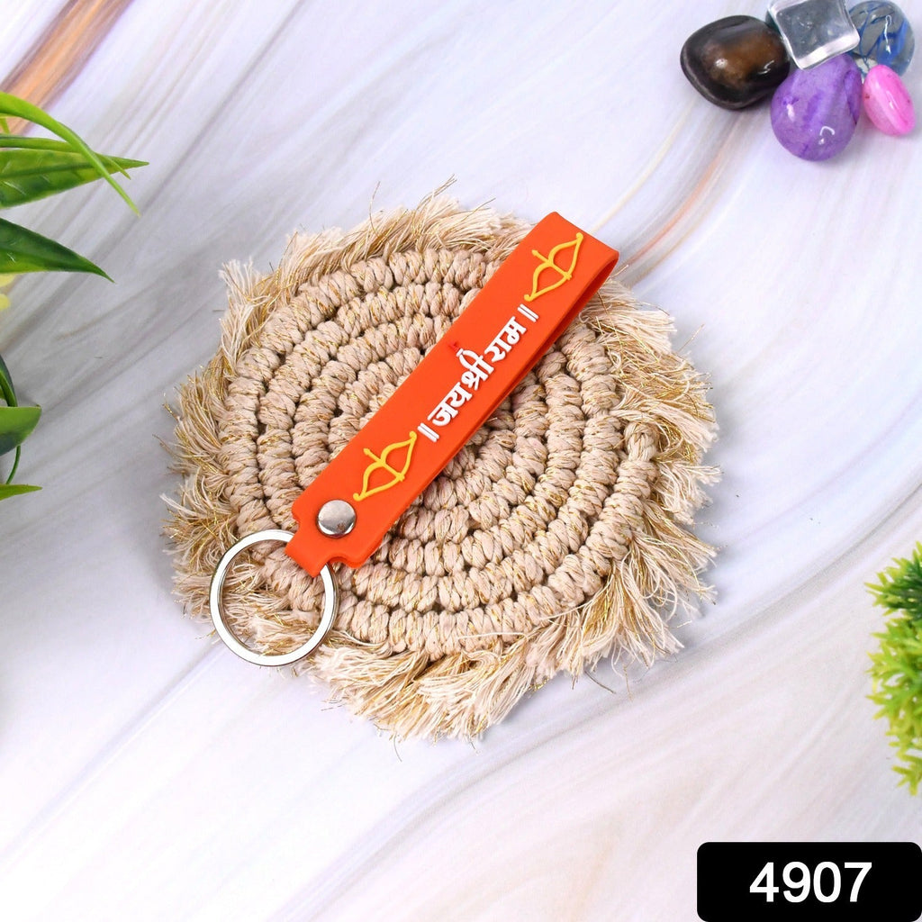 Close-up view of Jai Shree Ram inscription embossed on keychain