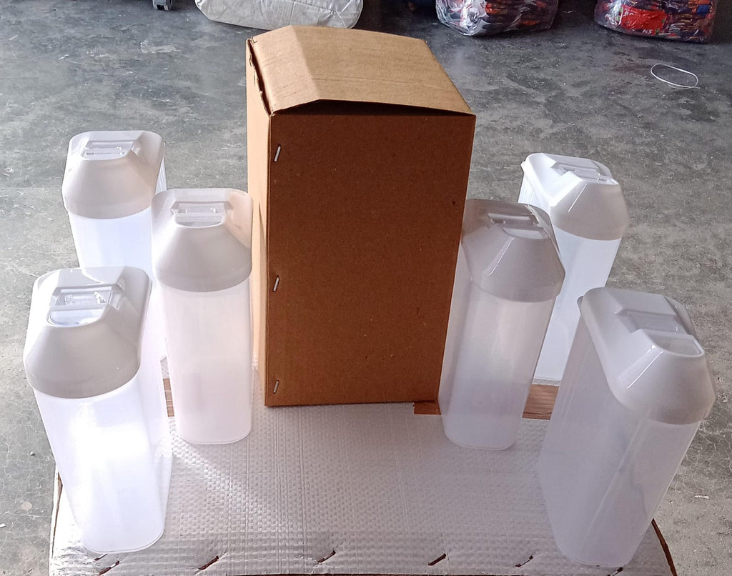 Arrangement of Organivo easy flow plastic storage containers in a kitchen setting.