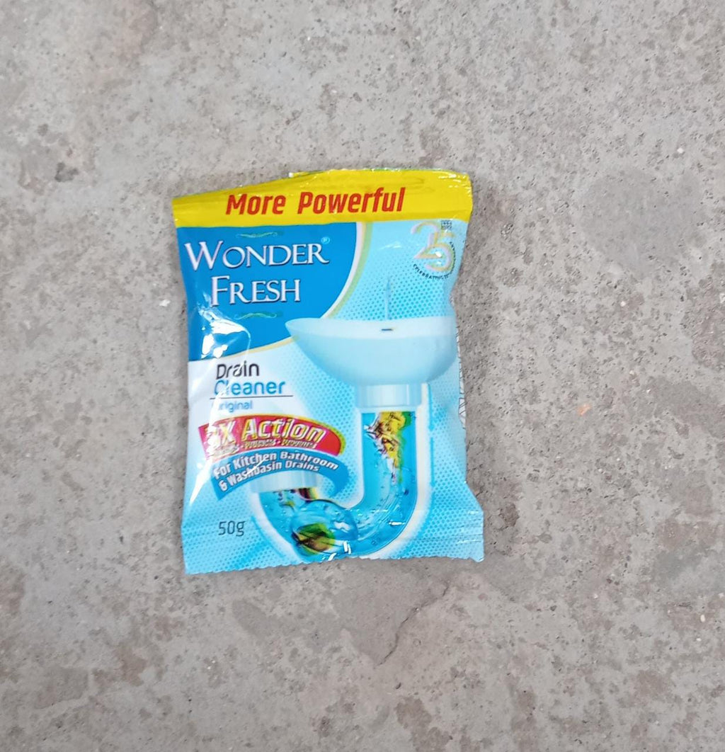 Multiple packs of Wonder Fresh Drain Cleaner Powder, 50g each, for home use.