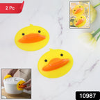 Close-up of duck-shaped silicone hot pot holder with heat resistant surface