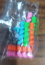 Variety of spiral cable protectors displayed on several electronic cables.