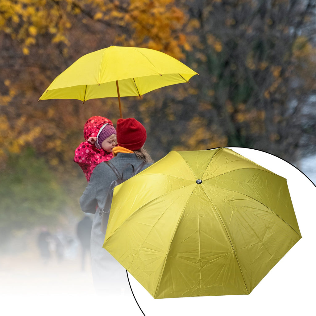 Open vegetable shaped folding umbrella providing sun and rain protection.