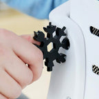 Detailed view of the Snowflake Multi-Tool's integrated screwdrivers and wrenches.