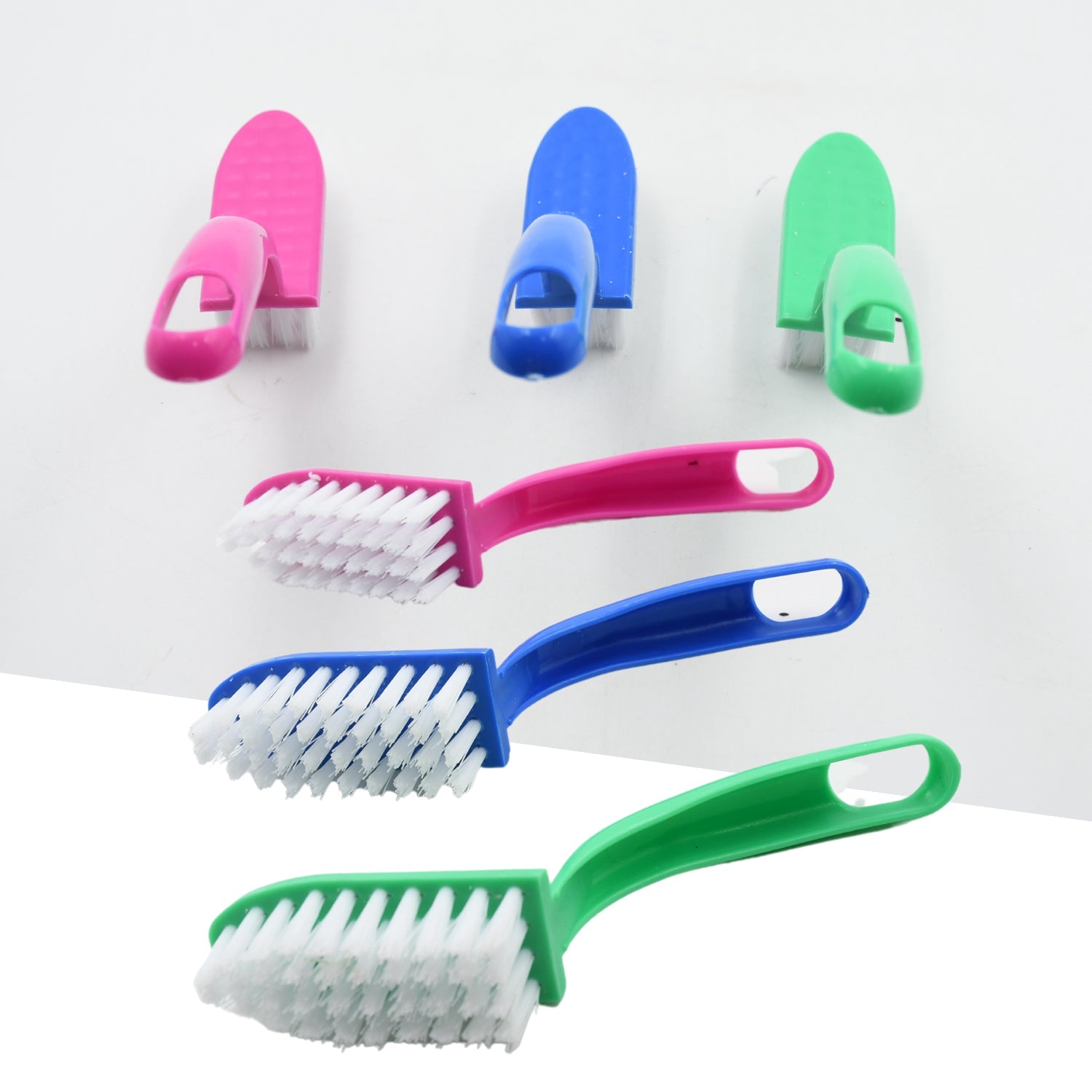 Three versatile cleaning brushes for various kitchen applications.