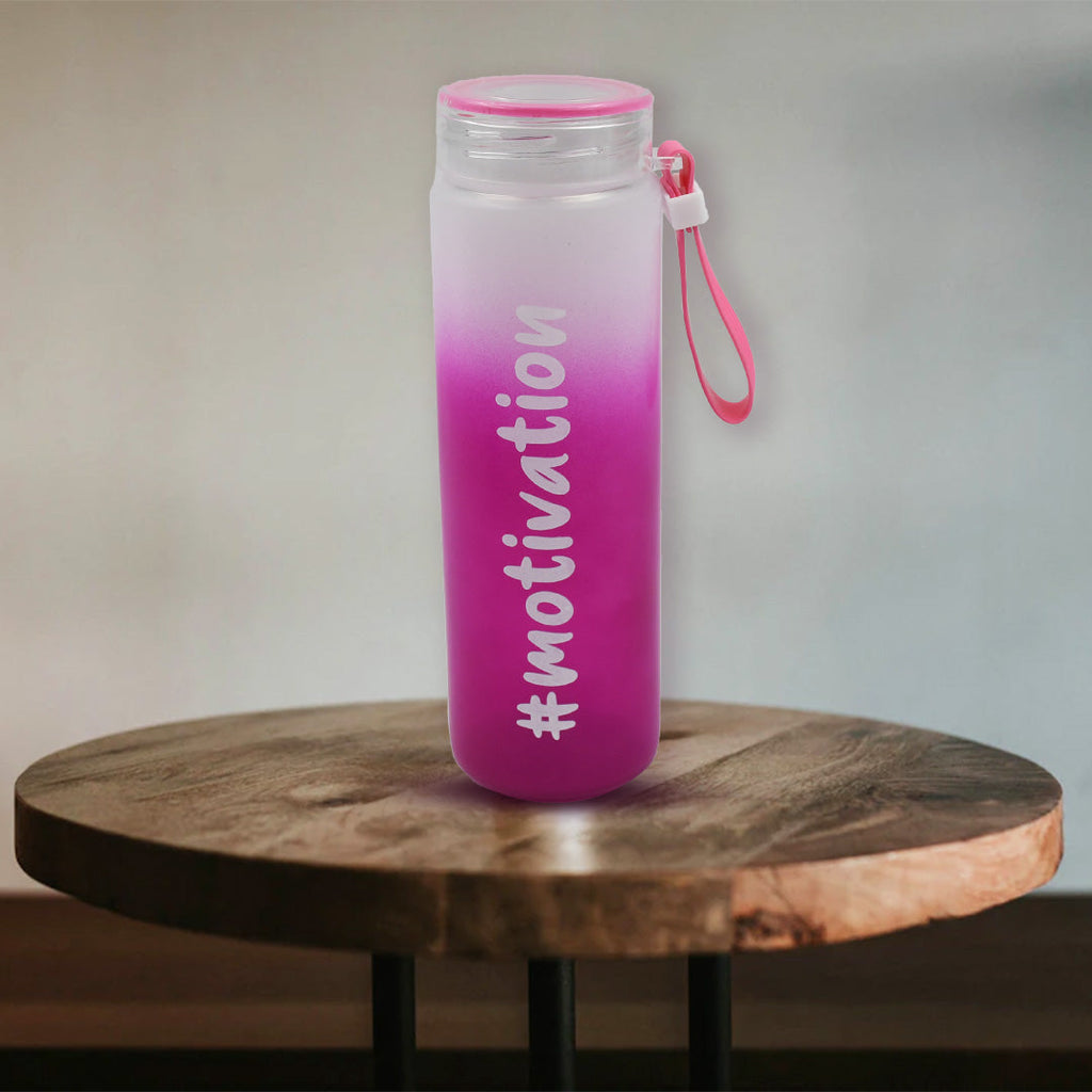 Clear 350 ML glass water bottle with measurement markings to track daily hydration.