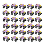 An overhead shot of the friction powered toy cars, highlighting their compact size and variety.