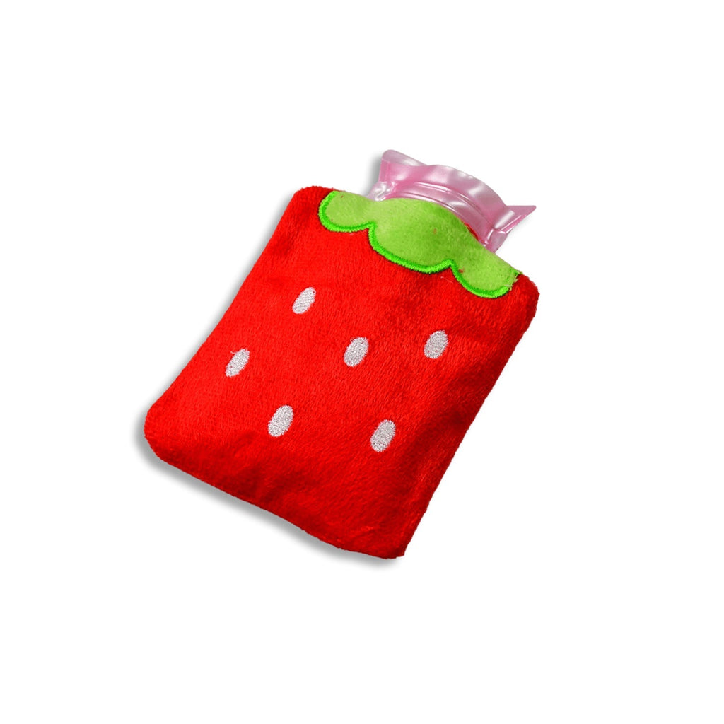 Mini strawberry hot water bag held in hands, emphasizing its portable size.