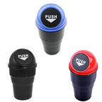 Car dustbin placed in a vehicle's cup holder, showcasing its snug fit.