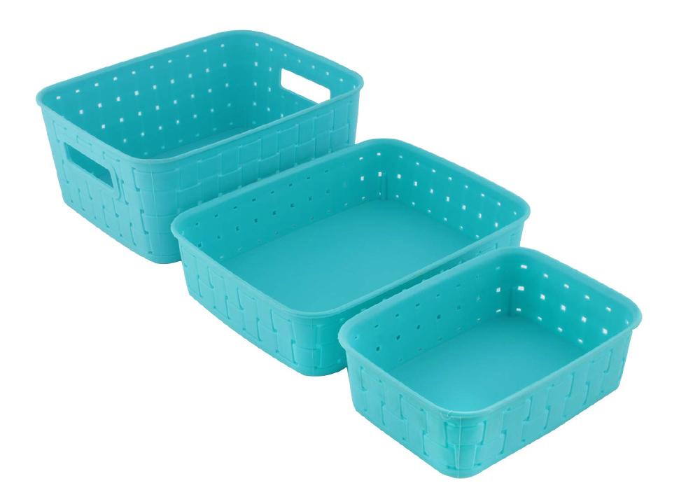Neatly stacked sky blue storage baskets, ready to organize your pantry.