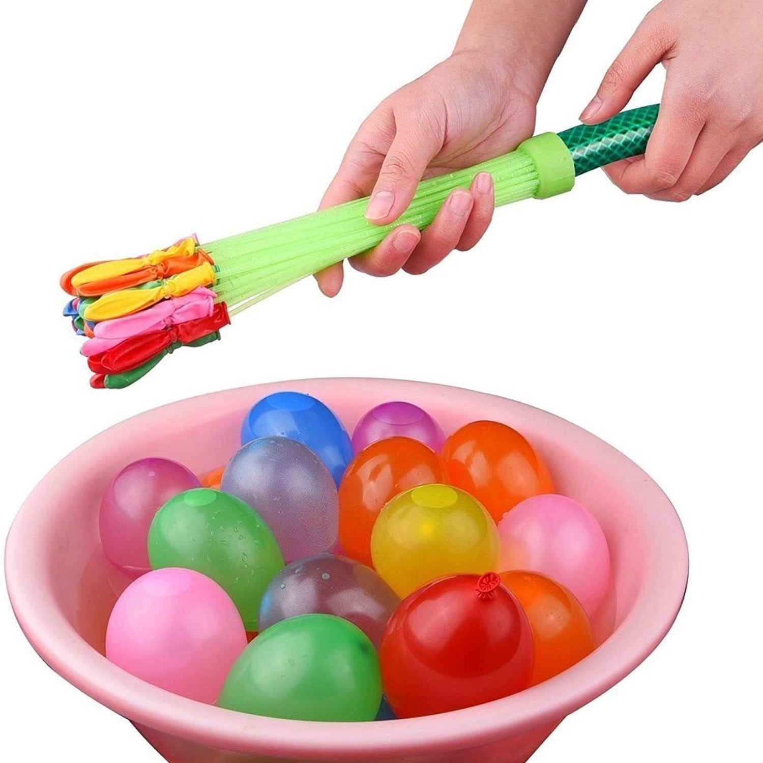 Close-up of a hand holding a cluster of brightly colored water balloons.