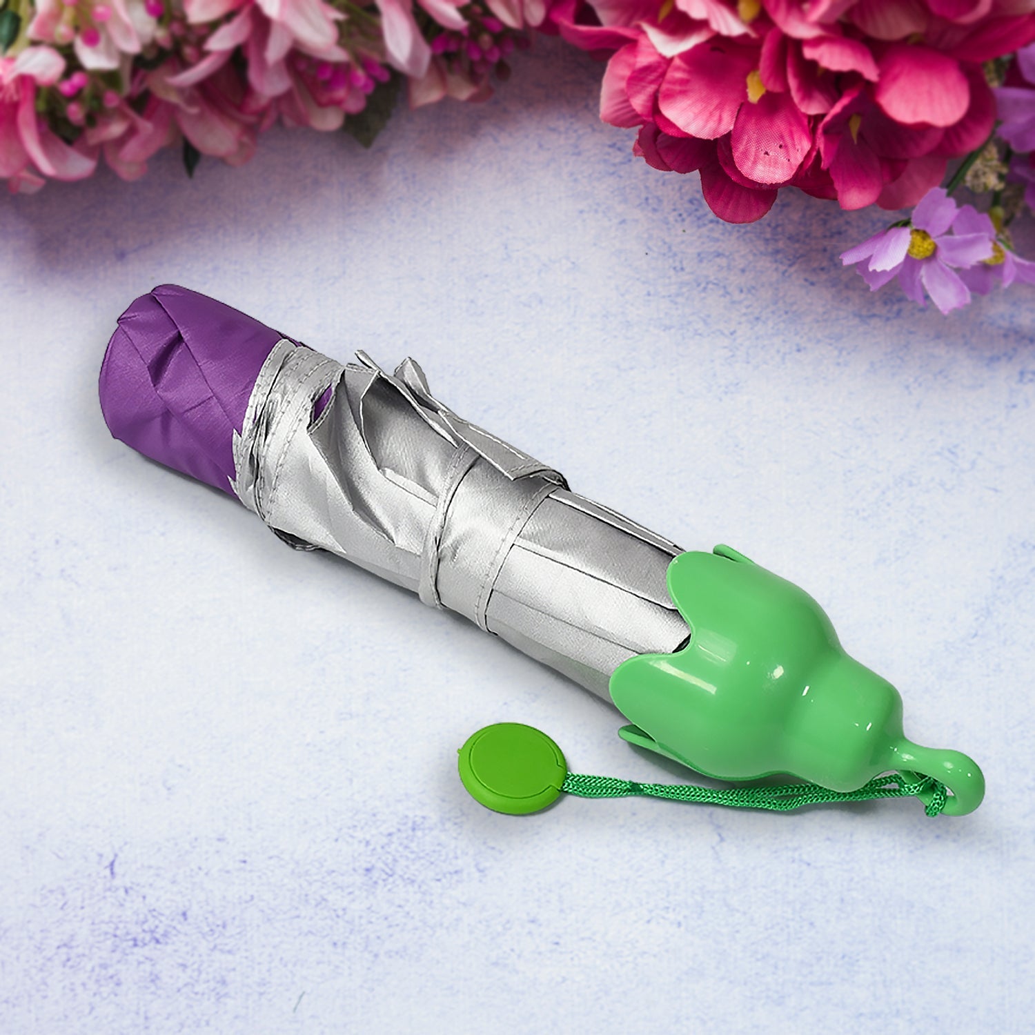 Compact mini umbrella featuring a unique vegetable design.