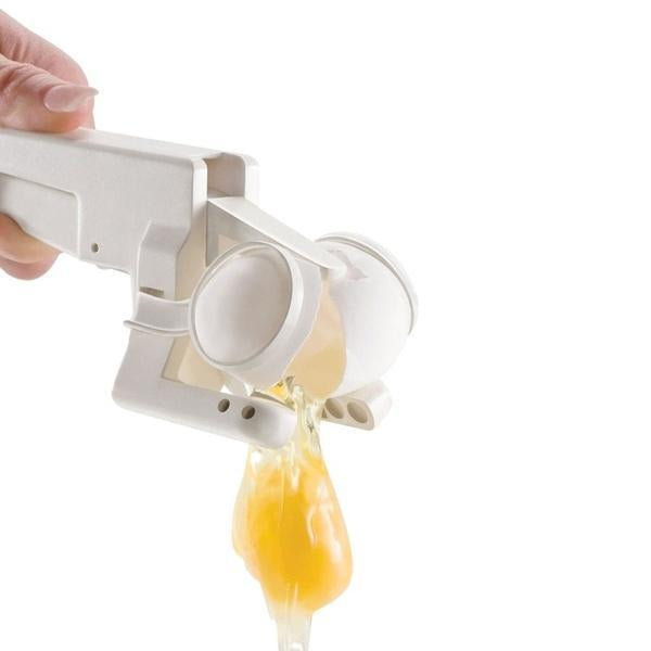 Ergonomic handheld egg cracker with its detachable egg yolk separator, ready for easy kitchen tasks.