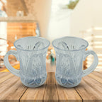 Two LED light-up cups with handles, glowing with multi-colors, ready for a fun party.