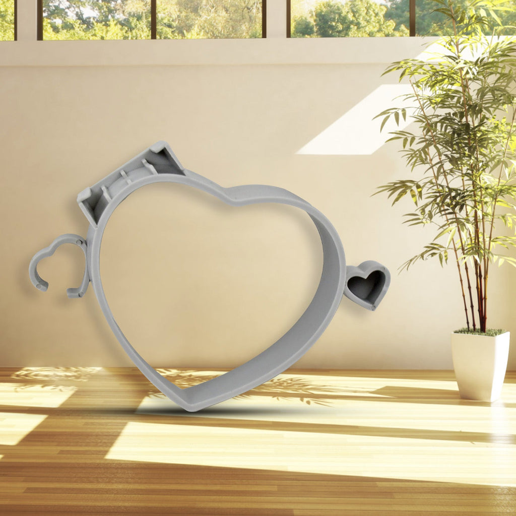 Front view of the self-adhesive hair dryer storage rack, ready for use.