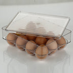 Side view of the Organivo 12-cavity egg storage container in a refrigerator.