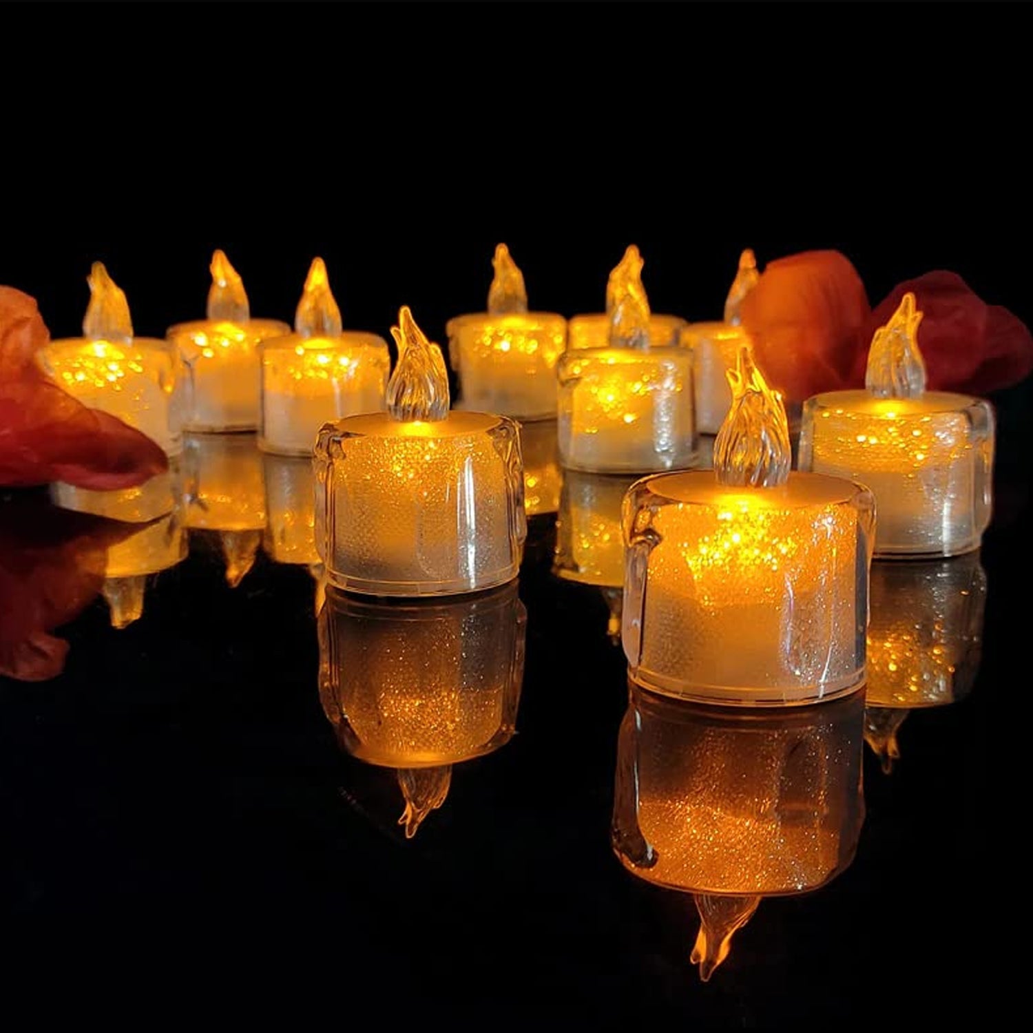 A cluster of glowing flameless LED tea light candles, creating a warm, inviting ambiance.