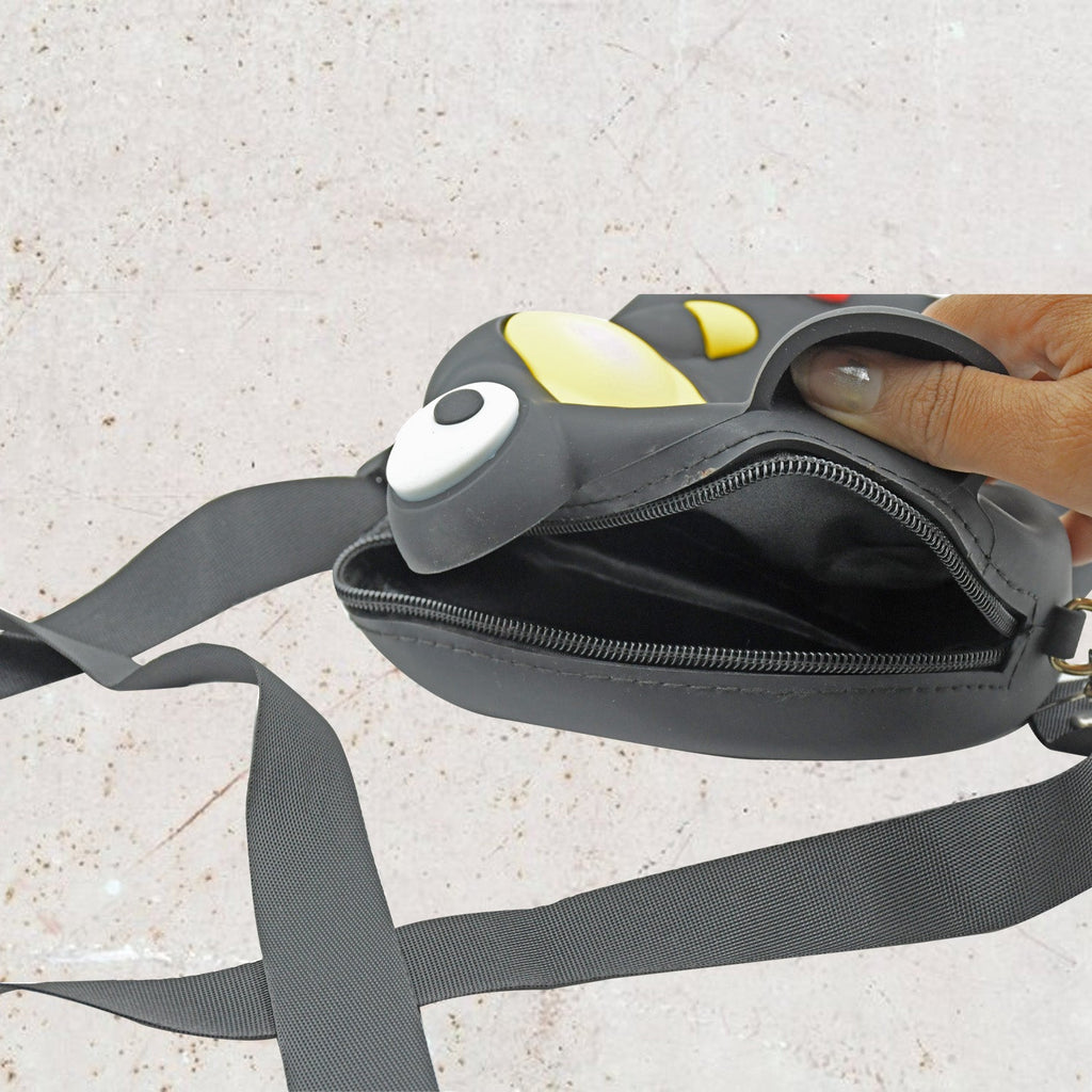 Side view of the portable bag for girls, revealing its compact yet spacious design for small essentials.